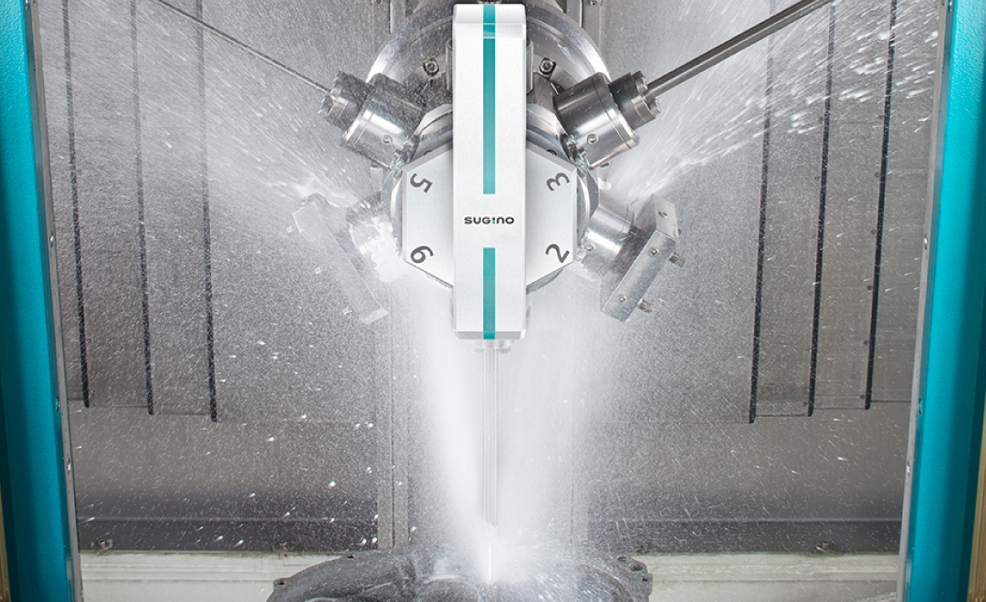 The turret of tools inside the JCC high pressure water jet deburring and parts washing system