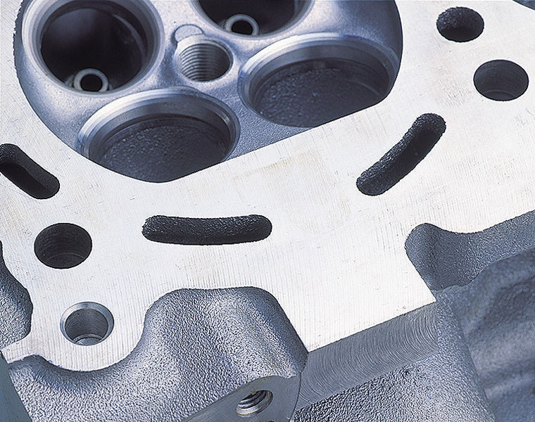 An automotive part after parts testing for deburring and part cleaning with the Sugino JCC high pressure water jet