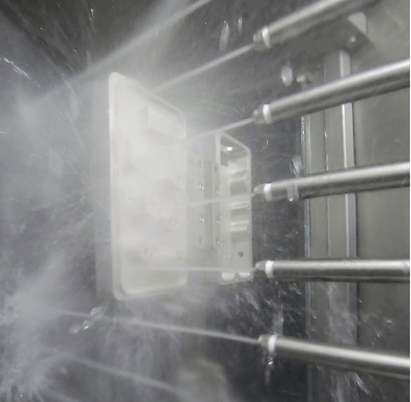 Animated image of the swing arm targeting in the modular parts washer from Sugino